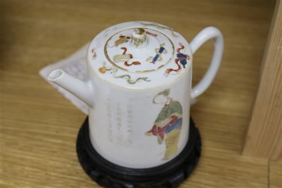 A Chinese famille rose teapot and cover, Daoguang period, wood stand teapot 11cm.